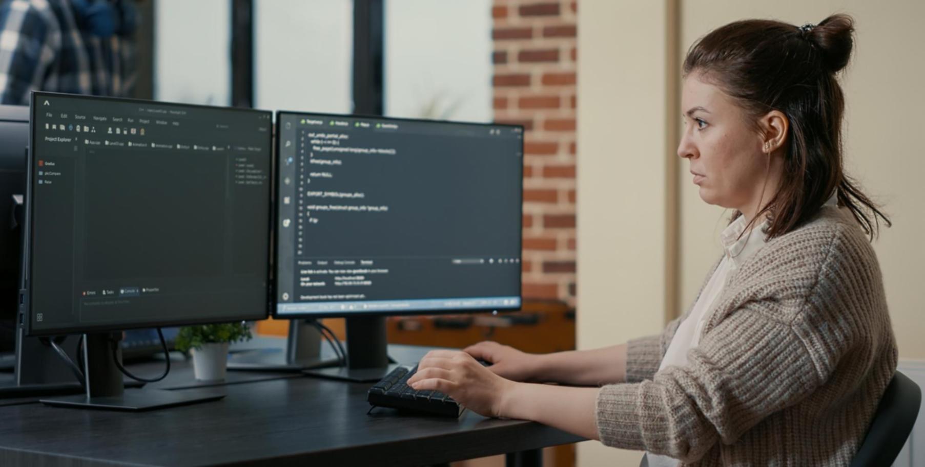 Security assessment and blockchain code analysis workspace showing multiple monitors with smart contract code